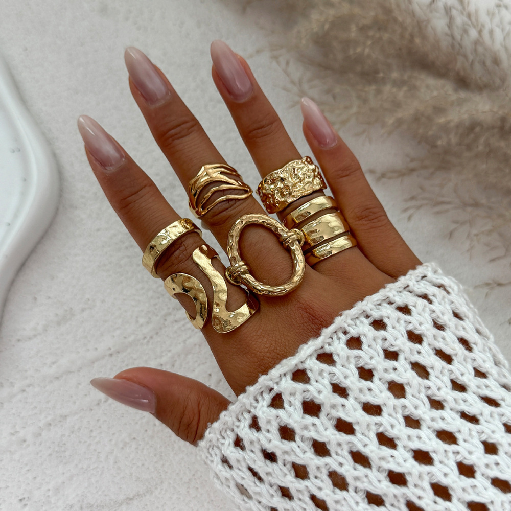 Irregularly shaped openwork alloy ring set