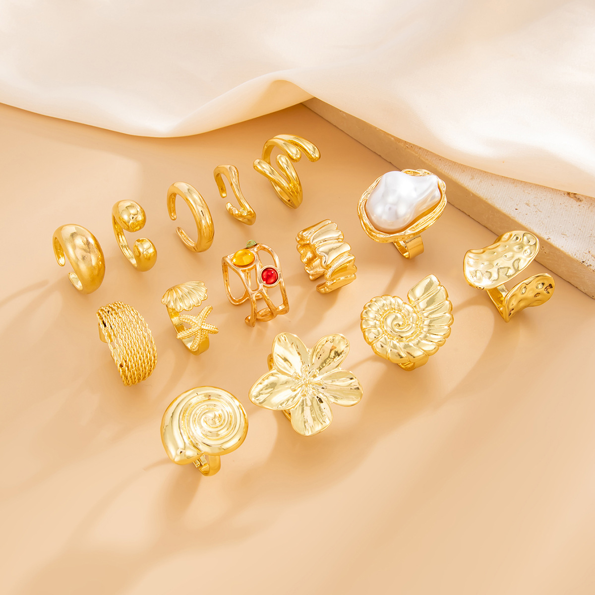 14-piece set of faux pearl openwork irregular alloy rings