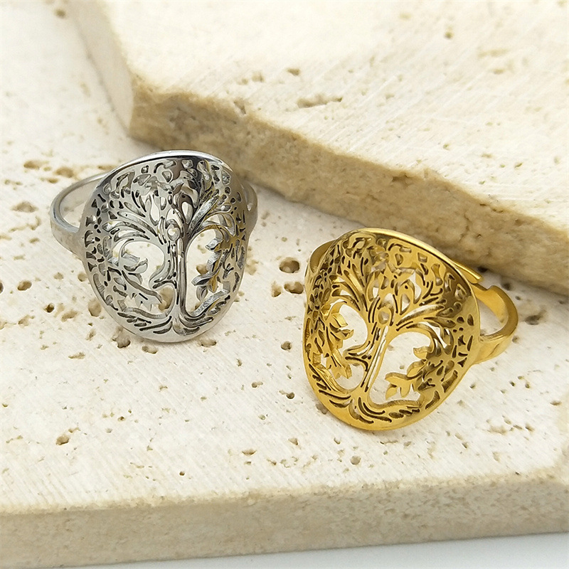 MYK3079-Creative and unique hollowed-out Tree of Life couple rings