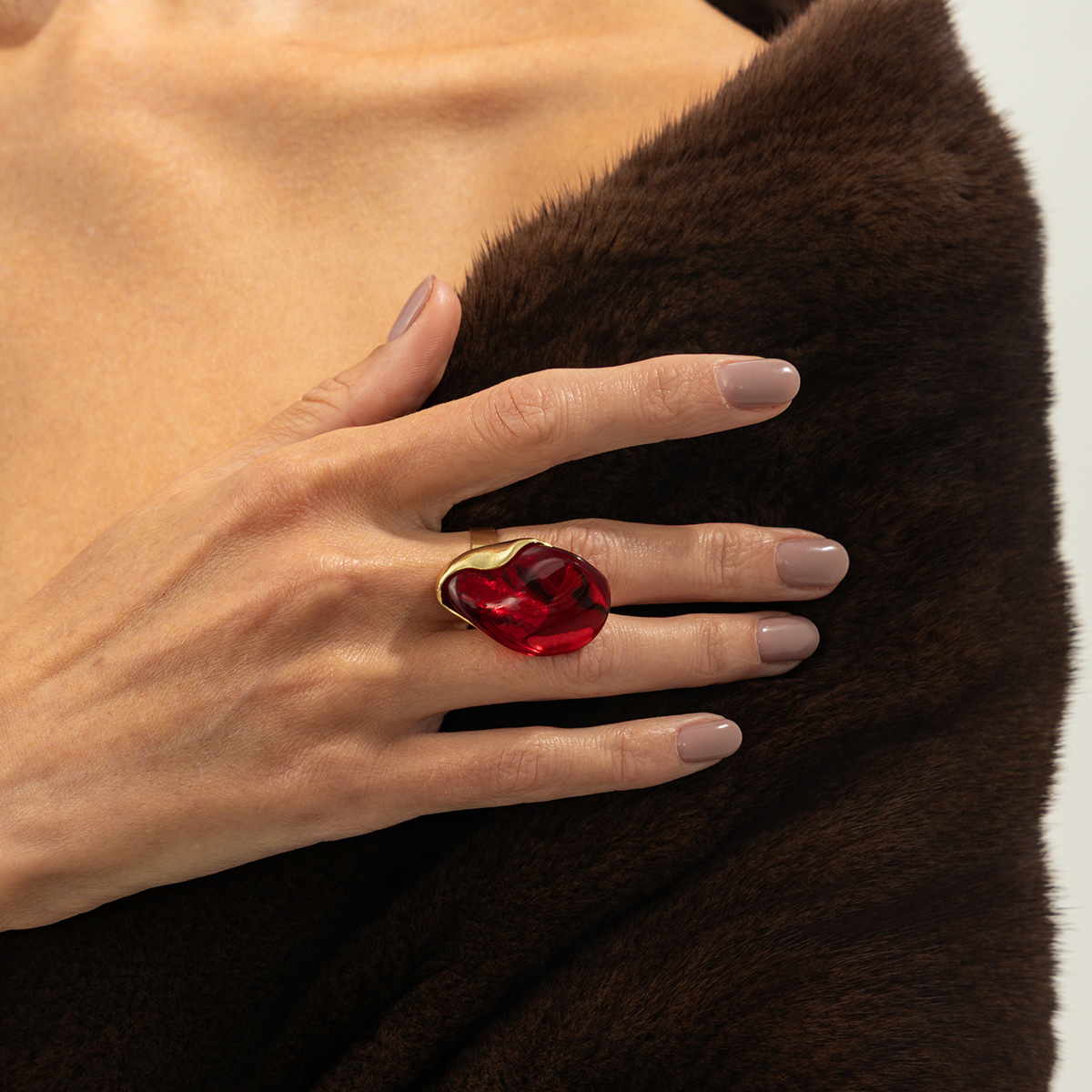 Irregularly shaped alloy resin ring with blurred patterns