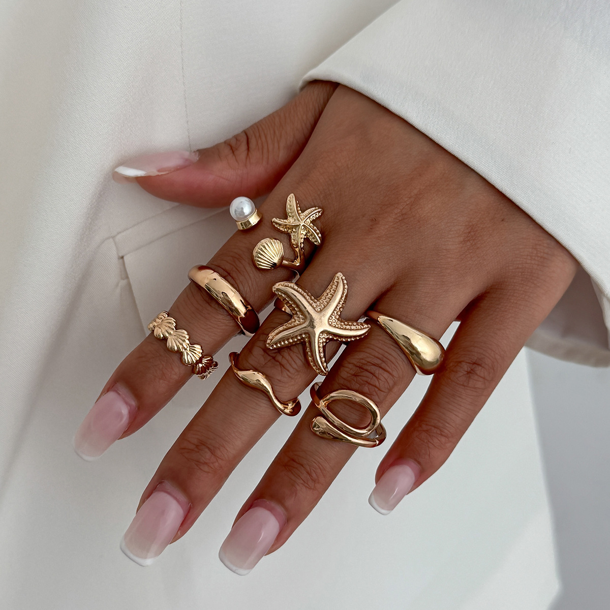 8-piece set of seashell and starfish alloy rings