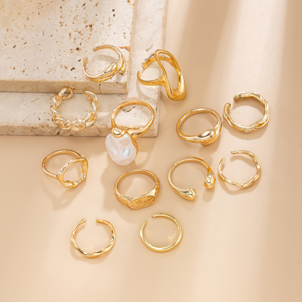 Premium Light-Sensitive Teardrop Hug Alloy Ring Set (12 Pieces)