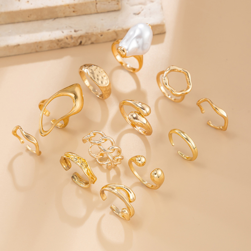 Premium Light-Sensitive Teardrop Hug Alloy Ring Set (12 Pieces)