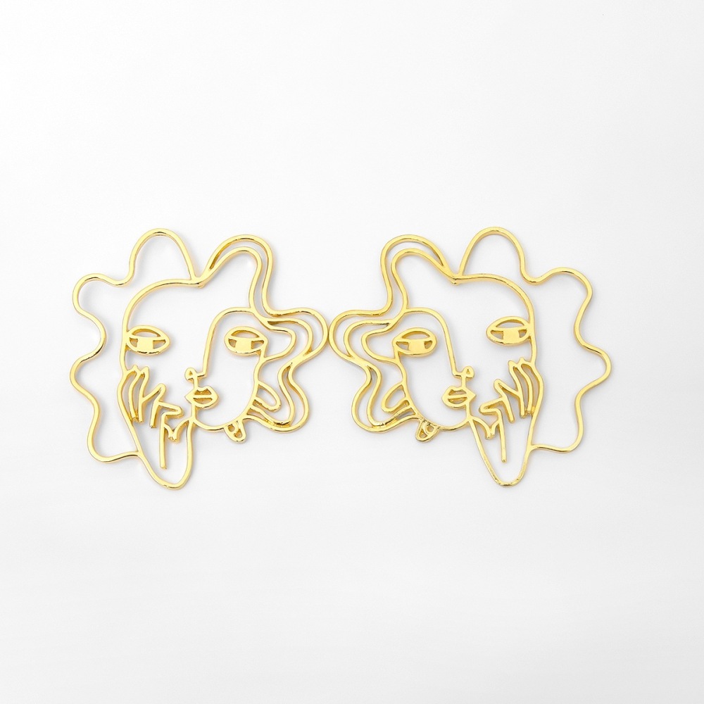 Hollowed-out 3D human face alloy earrings
