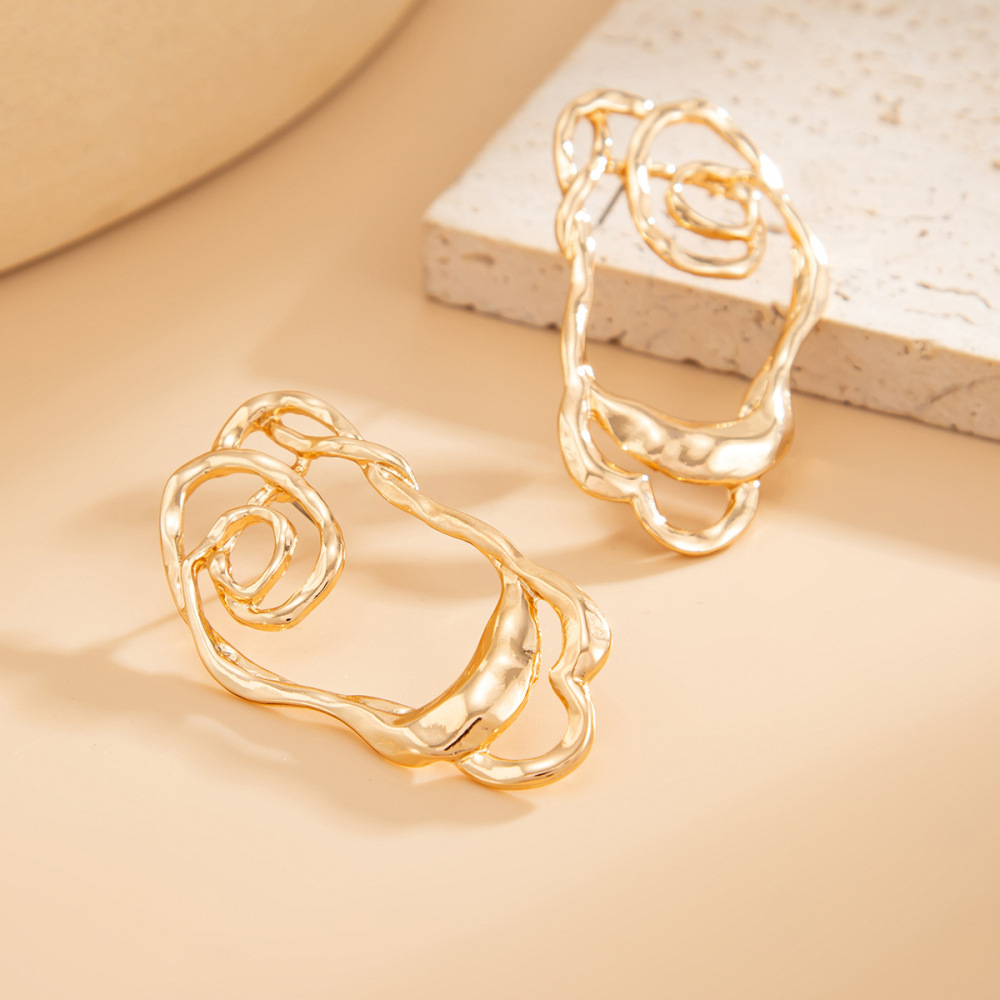 Unique irregularly pleated openwork alloy stud earrings