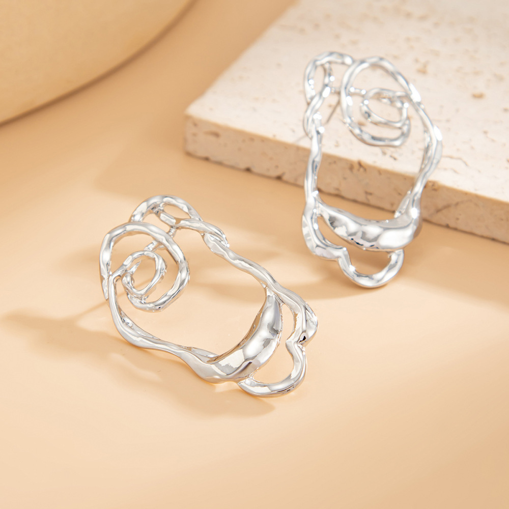 Unique irregularly pleated openwork alloy stud earrings