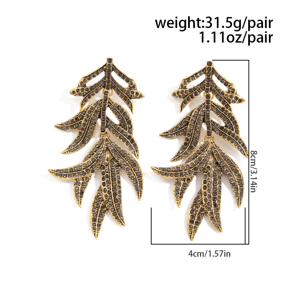 Exaggerated, micro-painted maple leaf alloy earrings