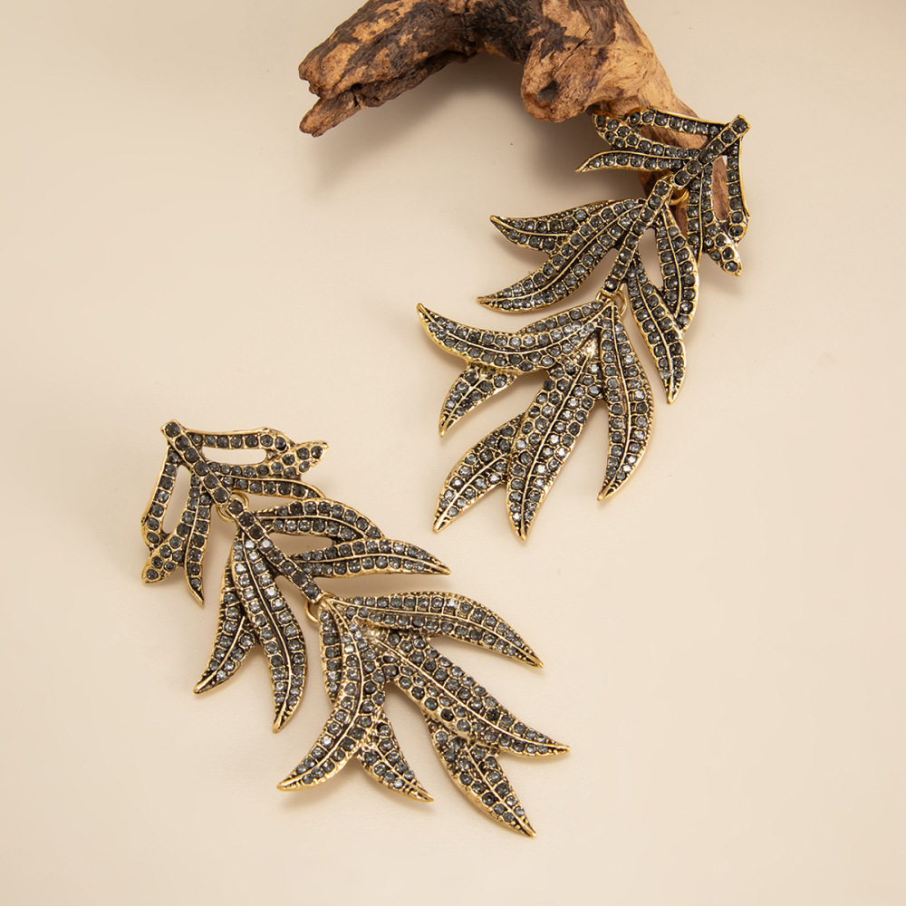 Exaggerated, micro-painted maple leaf alloy earrings