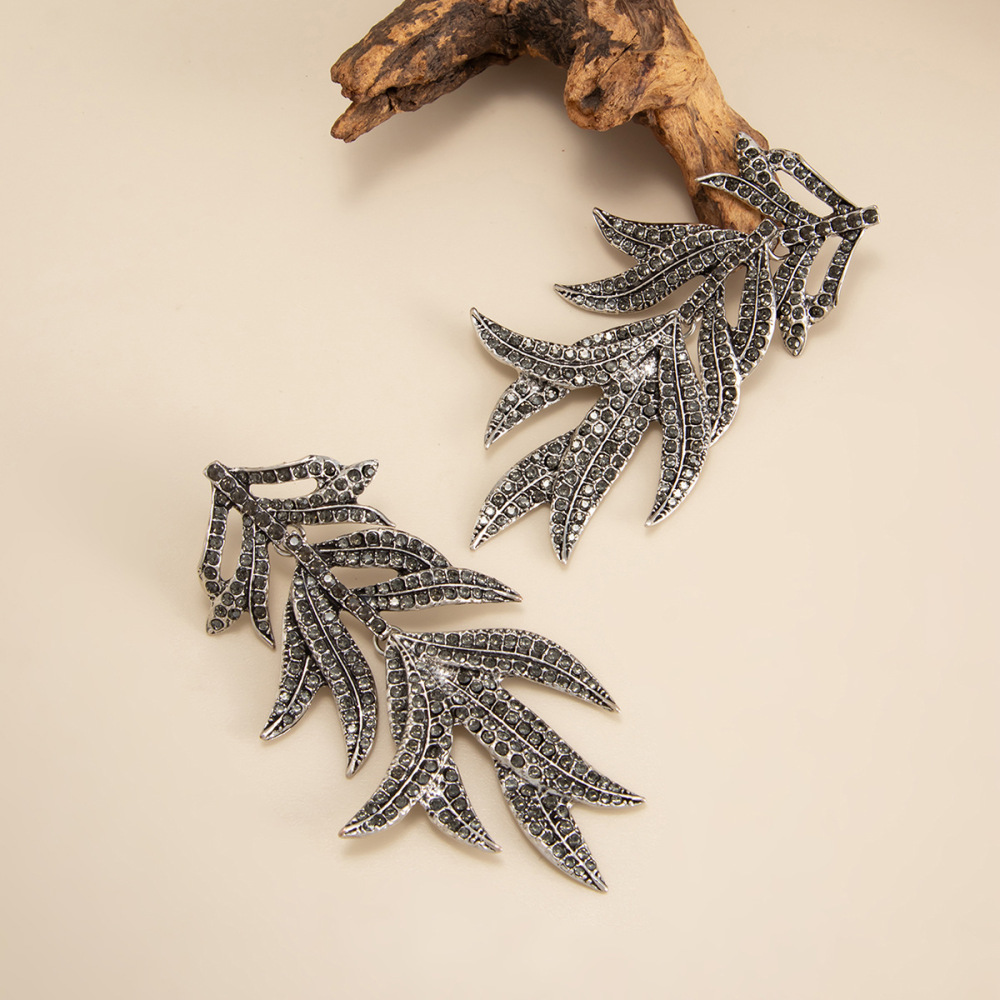 Exaggerated, micro-painted maple leaf alloy earrings