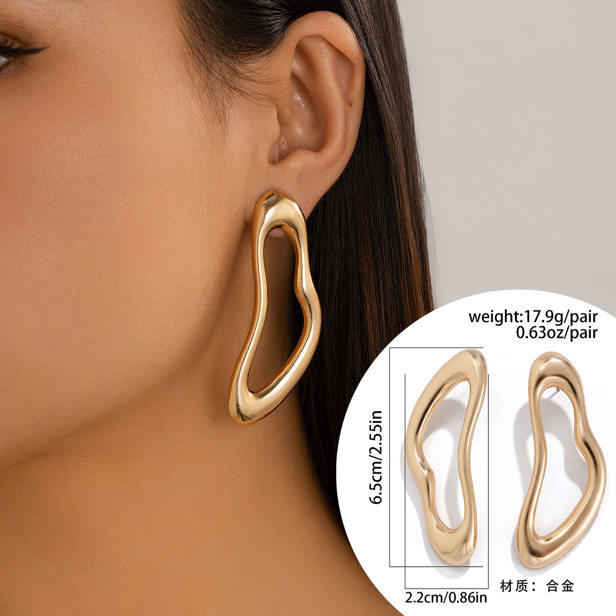 Exaggerated, irregularly shaped, openwork alloy earrings