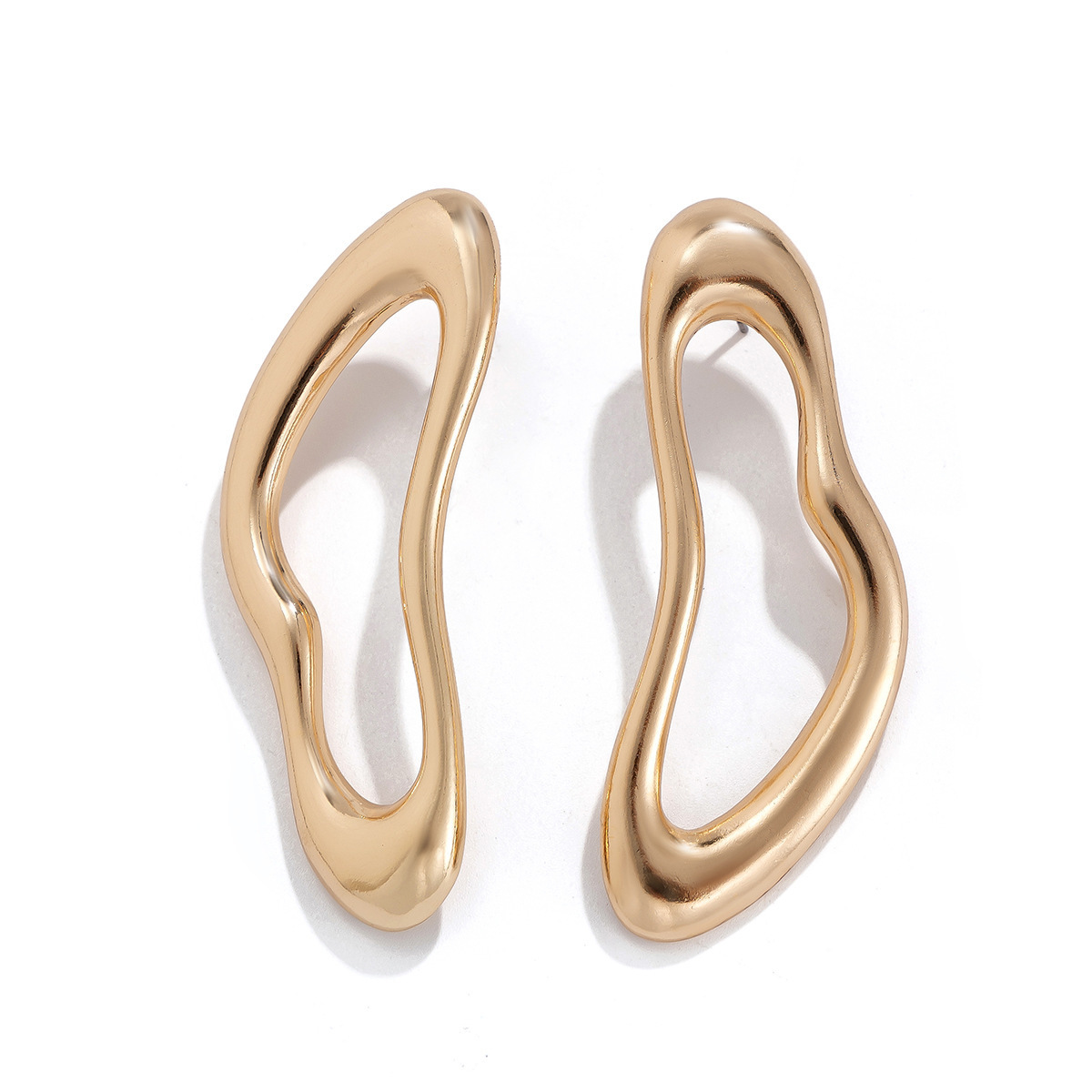 Exaggerated, irregularly shaped, openwork alloy earrings