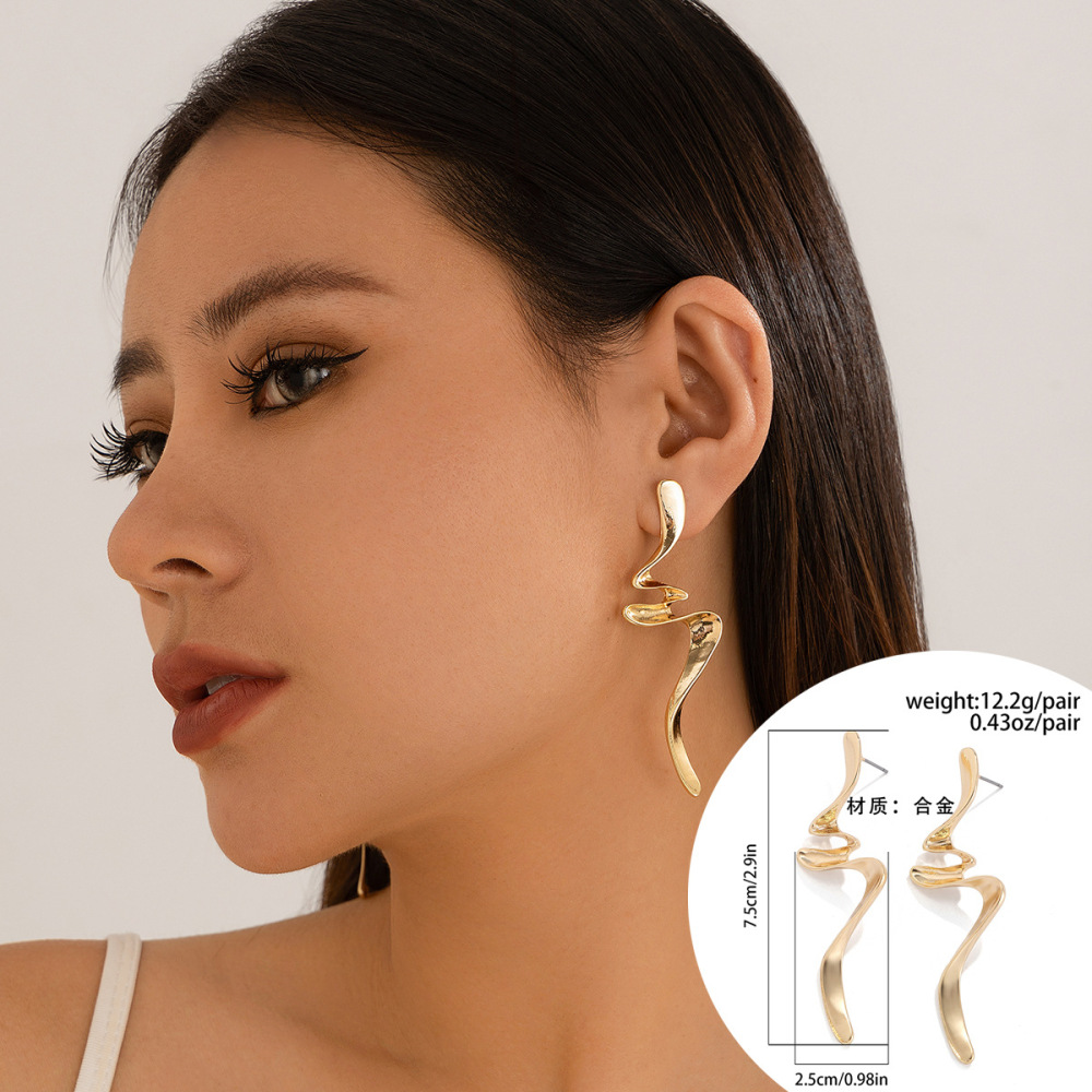 Exaggerated, irregularly twisted alloy earrings