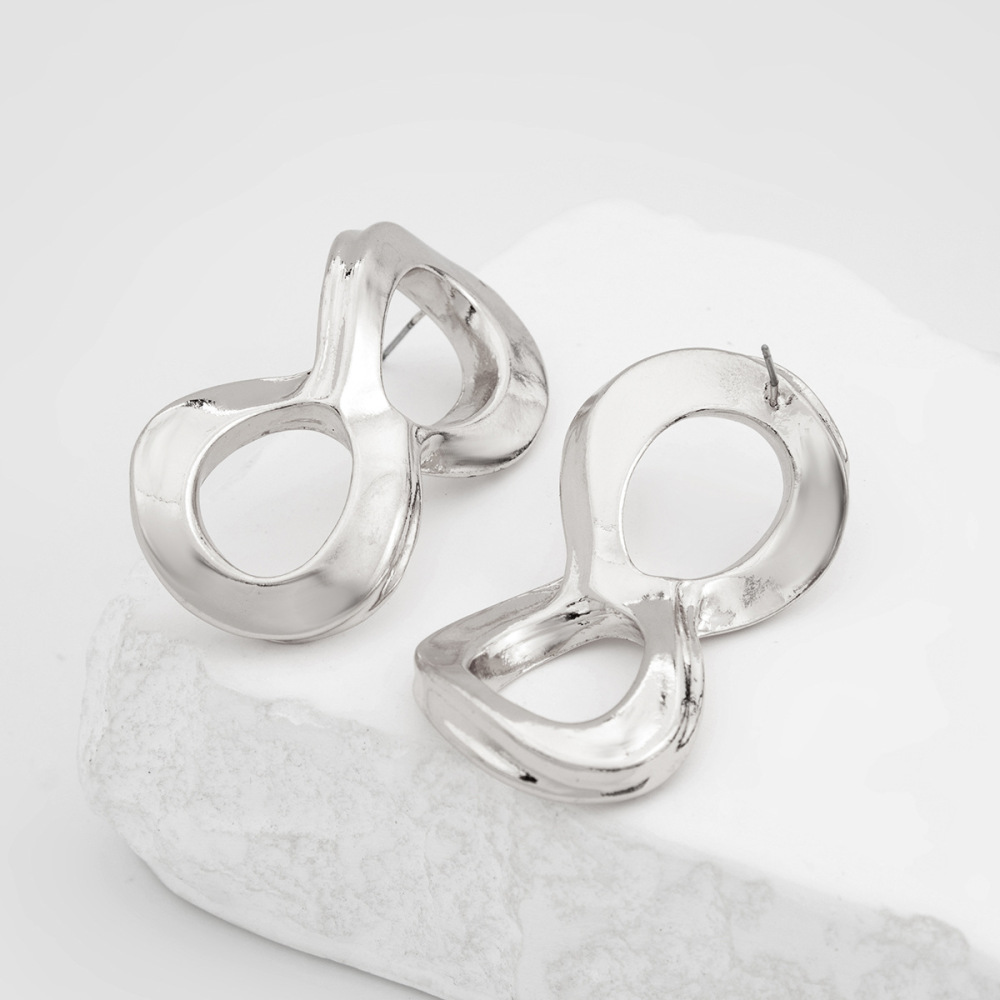 Irregularly shaped smooth twisted alloy earrings