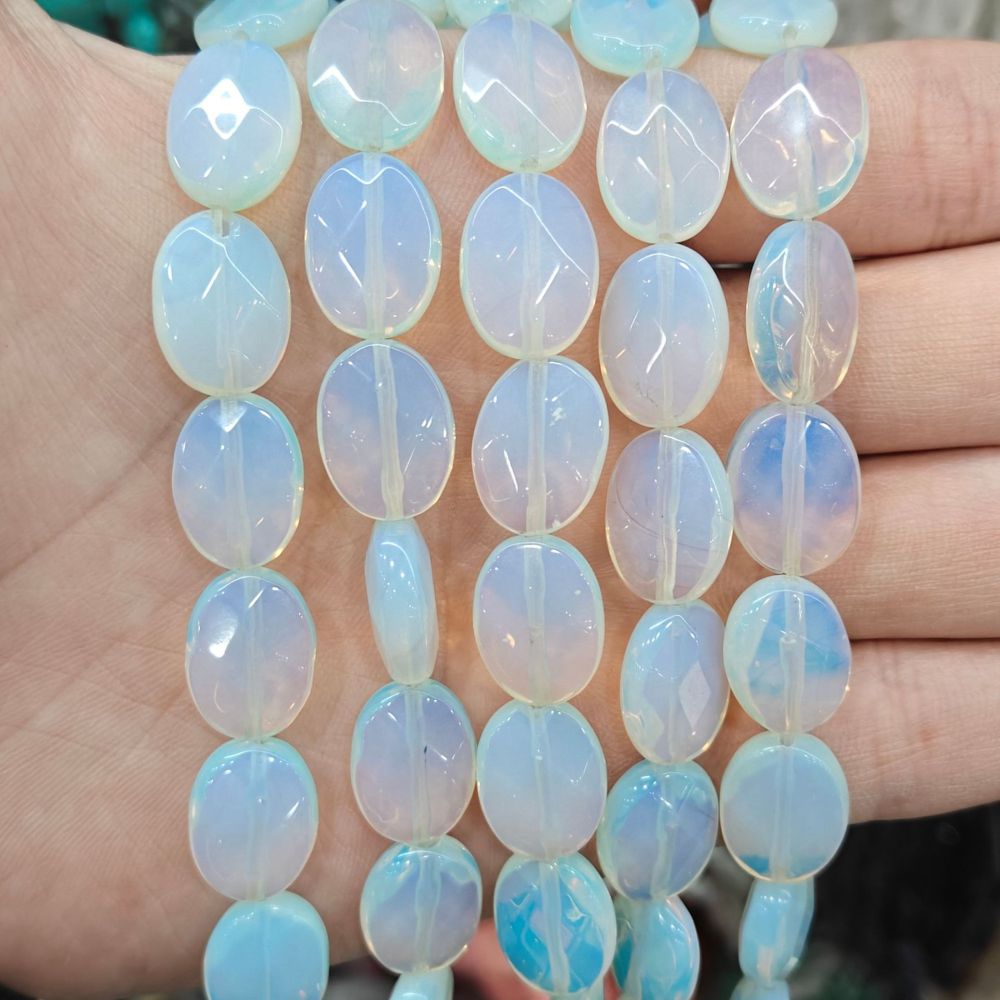 MYA3220--12x16mm Synthetic Opal Oval Faceted Beads