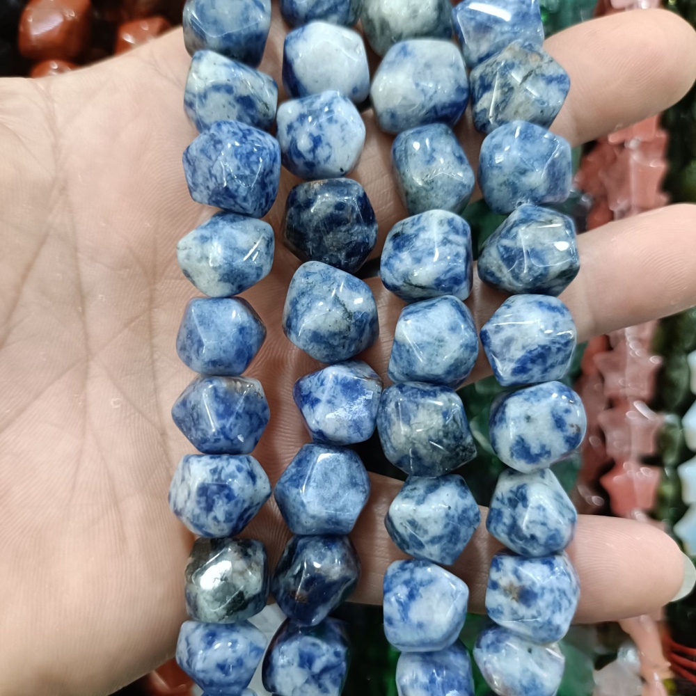 MYA3221--12-16mm irregularly shaped faceted cubes of Blue Spot stone (loose beads)