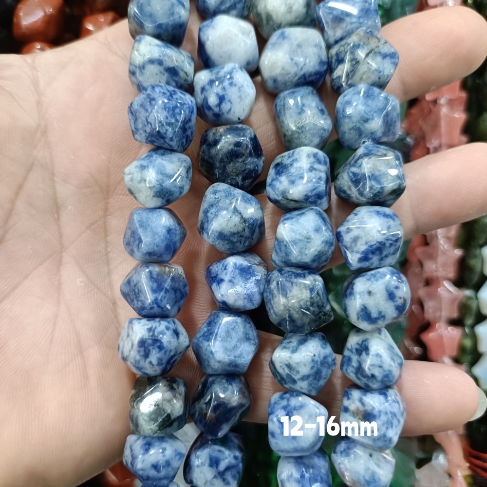 MYA3221--12-16mm irregularly shaped faceted cubes of Blue Spot stone (loose beads)