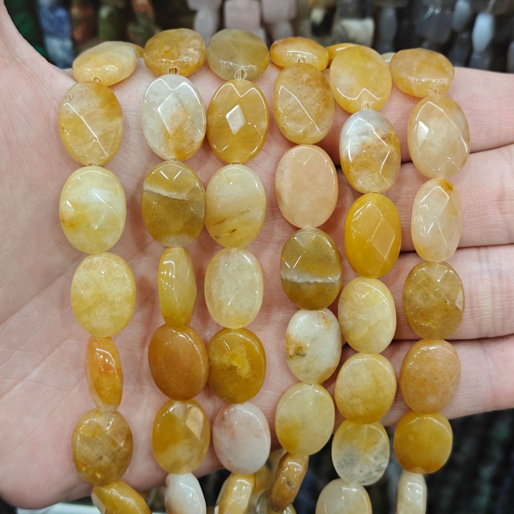 MYA3195--12x16mm Natural Topaz Oval Faceted Beads