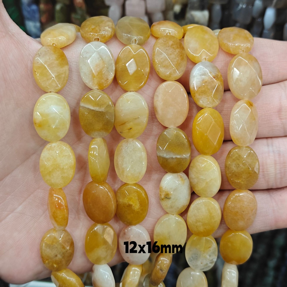 MYA3195--12x16mm Natural Topaz Oval Faceted Beads