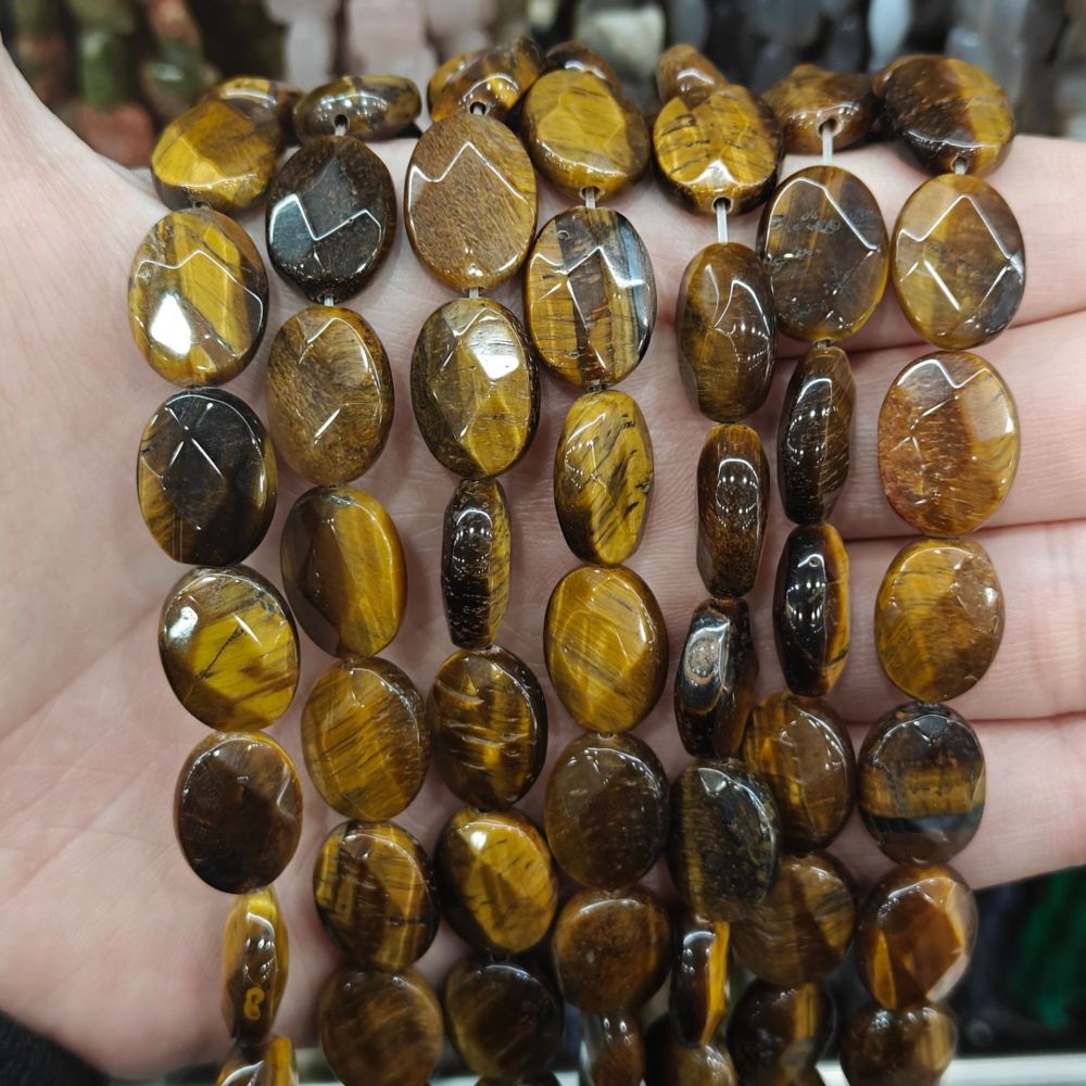 MYA3196--12x16mm Natural Tiger's Eye Oval Faceted Beads