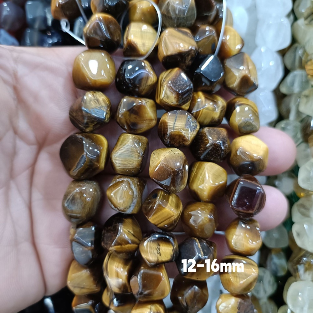 MYA3228--12-16mm irregularly shaped faceted tiger's eye (loose beads)