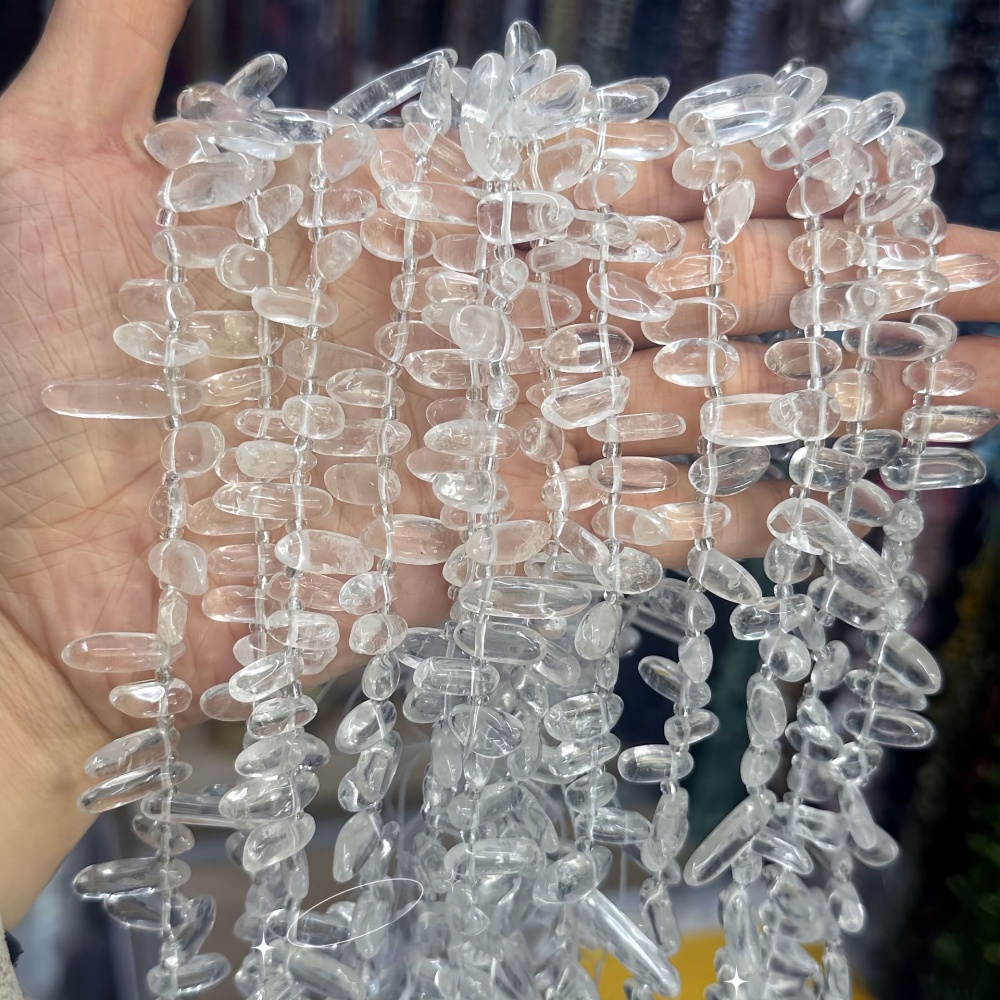 MYA3326--7-16mm Natural Clear Quartz Teardrop-Shaped Tooth Beads