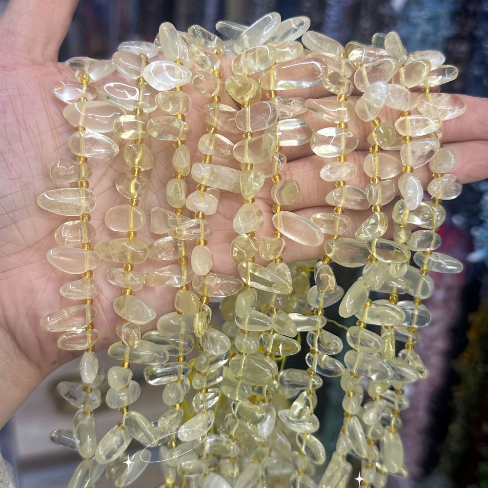 MYA3328--7-16mm Natural Lemon Quartz Teardrop-Shaped Tooth Beads
