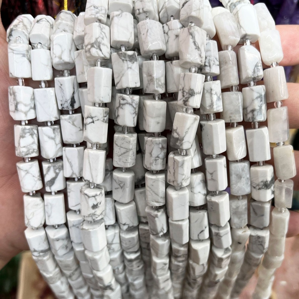 MYA3573--8x12mm Natural Howlite Faceted Cylindrical Beads