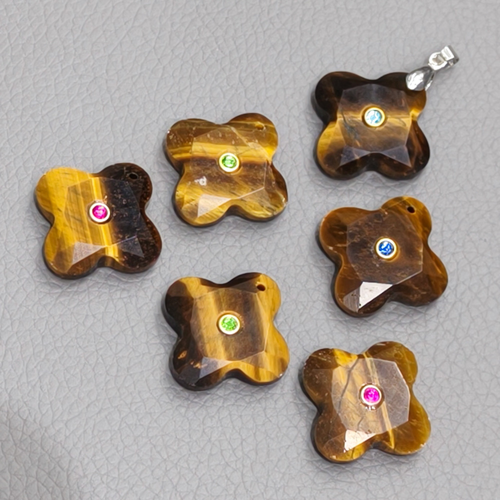 Natural stone and diamond-encrusted four-leaf clover pendant