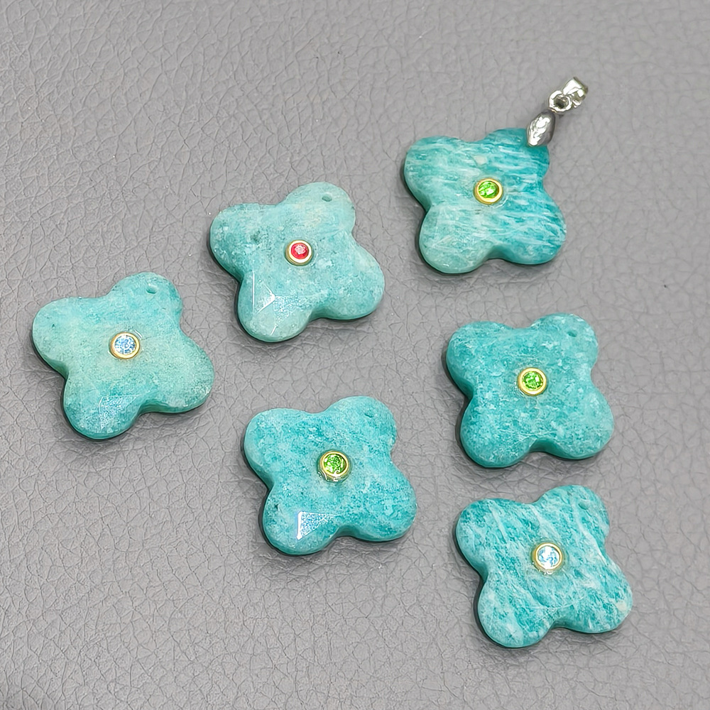 Natural stone and diamond-encrusted four-leaf clover pendant