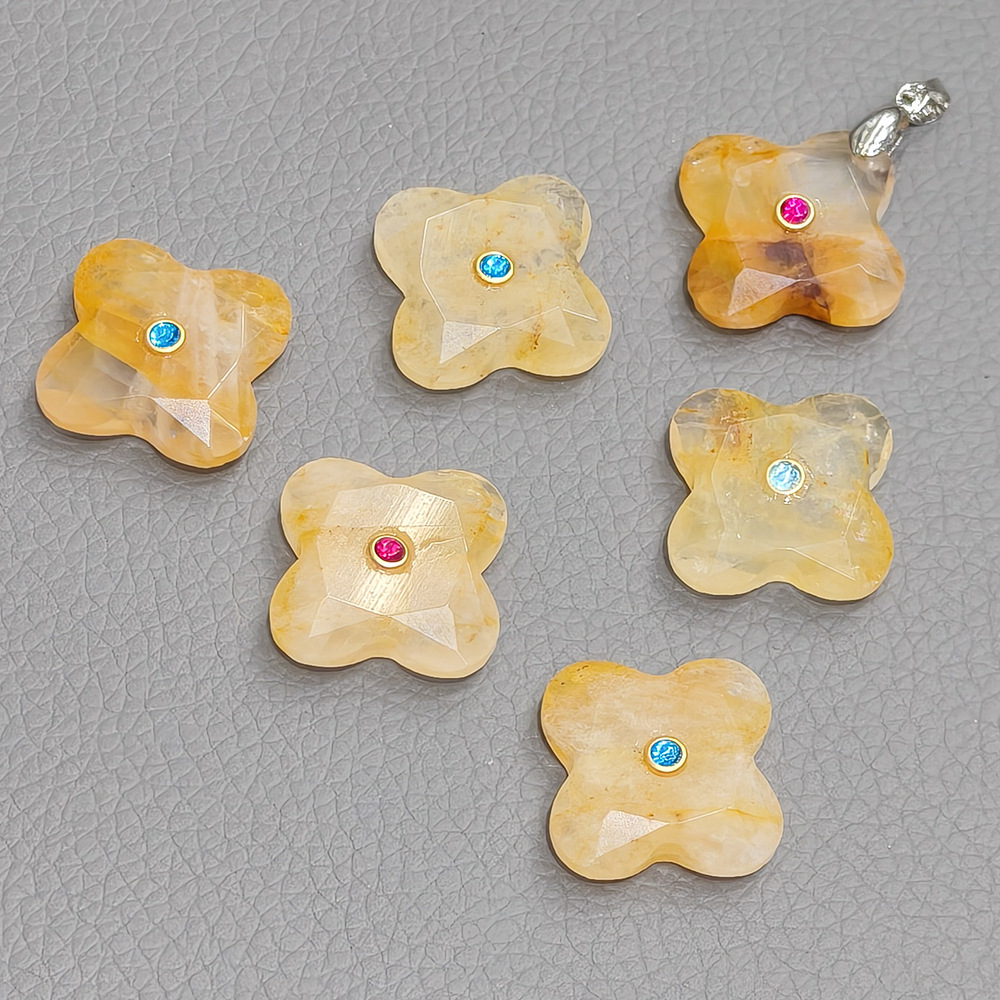 Natural stone and diamond-encrusted four-leaf clover pendant