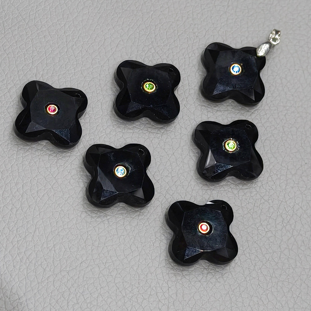 Natural stone and diamond-encrusted four-leaf clover pendant