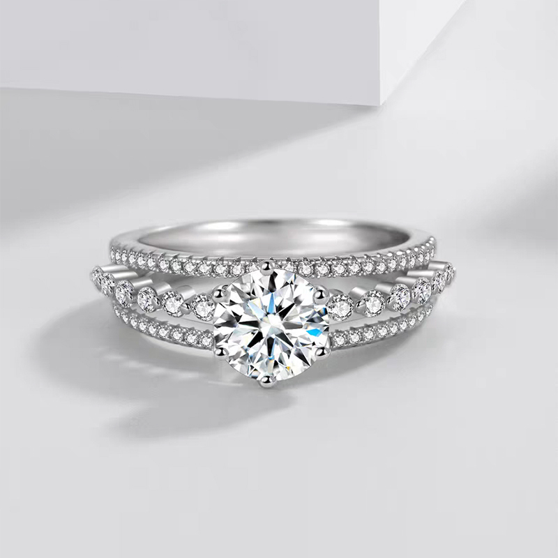Claw-set solitaire diamond ring with double-row full pavé band