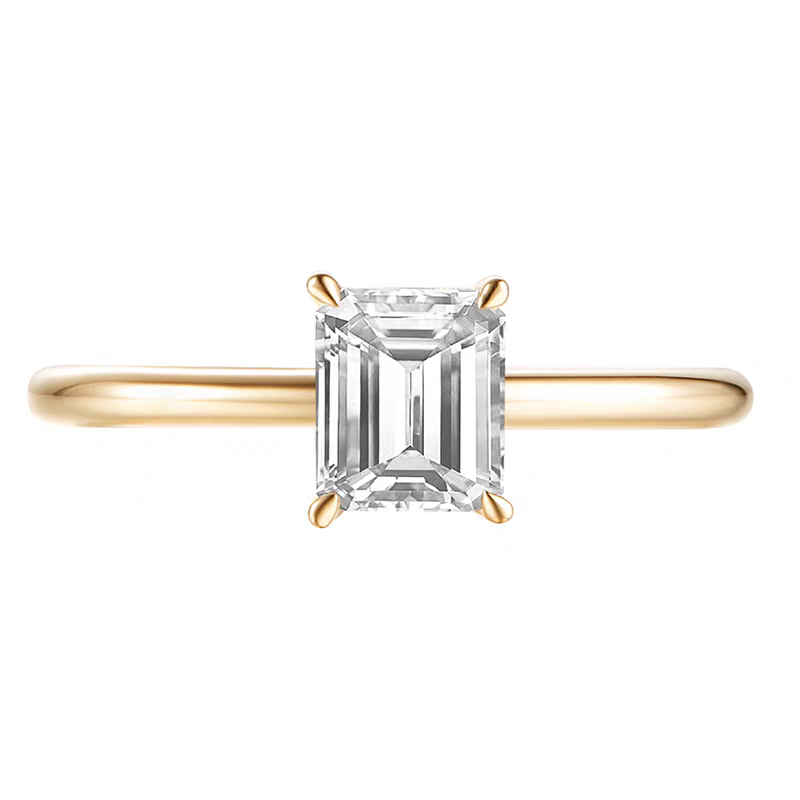 Emerald-cut diamond ring with a plain shank