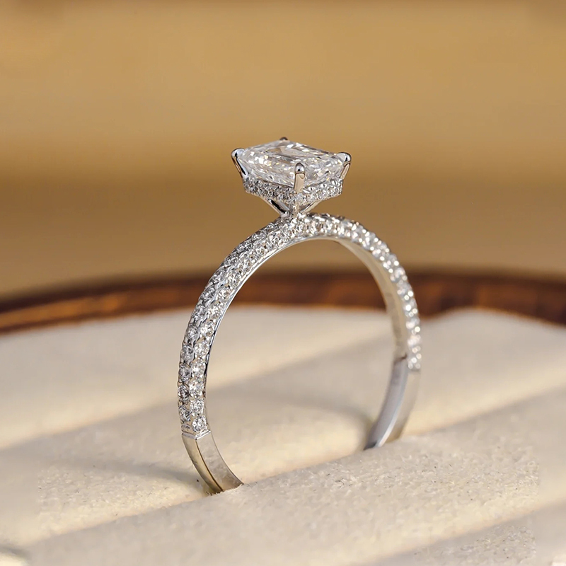 Emerald-cut fully set diamond ring