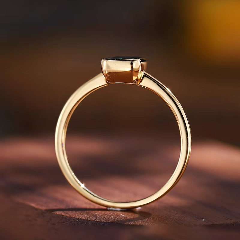 Princess-cut diamond ring with bezel setting