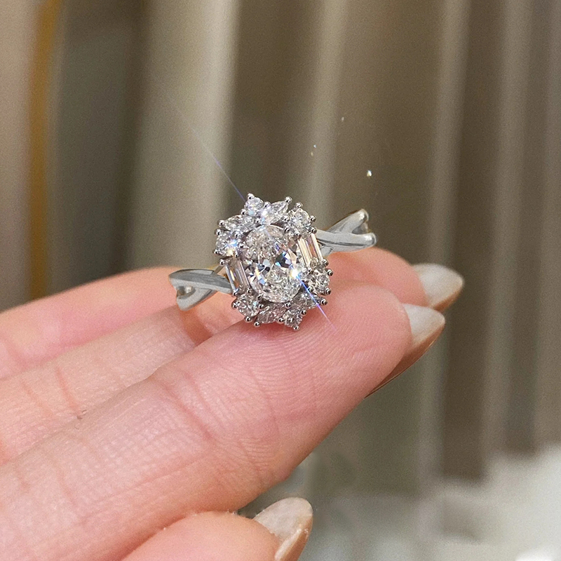 Oval-cut lab-grown diamond ring with a twisted shank