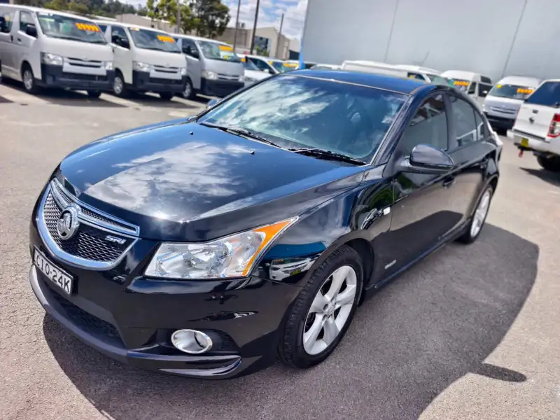 2012 HOLDEN CRUZE SRi, Black, low kilometers, sporty, $ 5999 Great looking car.