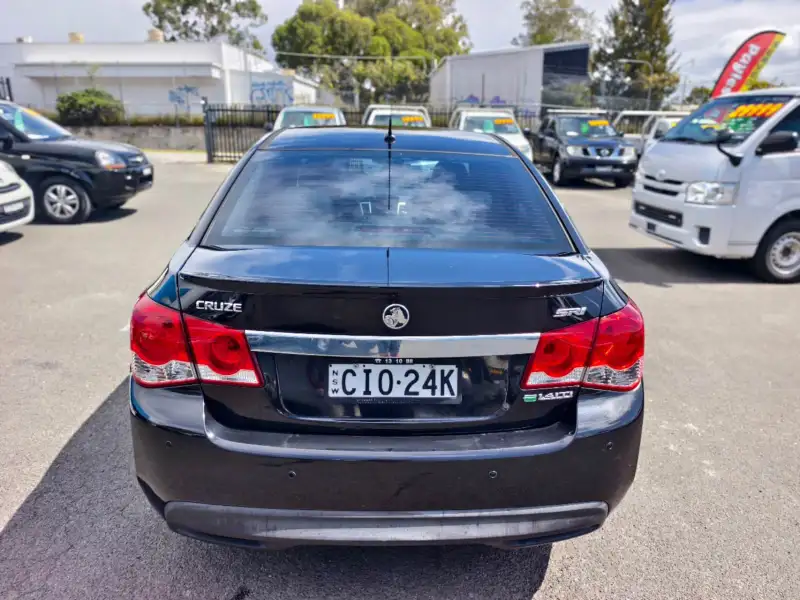 2012 HOLDEN CRUZE SRi, Black, low kilometers, sporty, $ 5999 Great looking car.