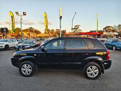 2009 HYUNDAI TUCSON CITY SX, auto, $ 5999 Great 1st car.