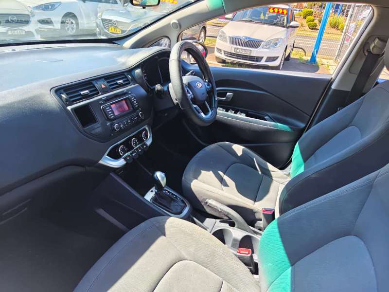 2014 KIA RIO S, auto, low kilometers, $ 7999 Cheap reliable 1st car.