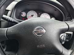 2004 NISSAN PULSAR Q, auto, $ 2999 Cheap reliable runaround.