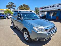2010 SUBARU FORESTER X, auto, low kilometers, $ 7750 Cheap reliable suv.
