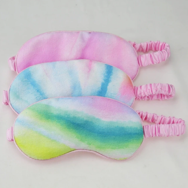 レインボーアイパッチは、圧力を下げてリラックスするソフトサテンの睡眠用アイマスクです。