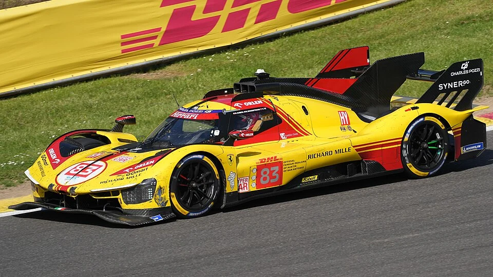 The Ferrari 499P AF Corsa is speeding along the racetrack.
