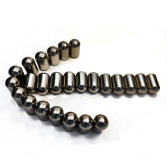 Tungsten carbide buttons and tips for rock drilling tools