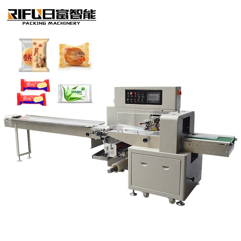 Pillow type heat shrink packing machine