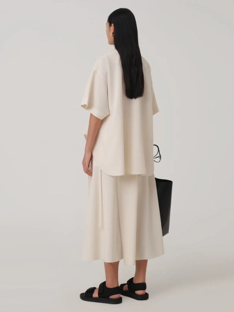 WRAP SILK MIDI SKIRT IN CREAM