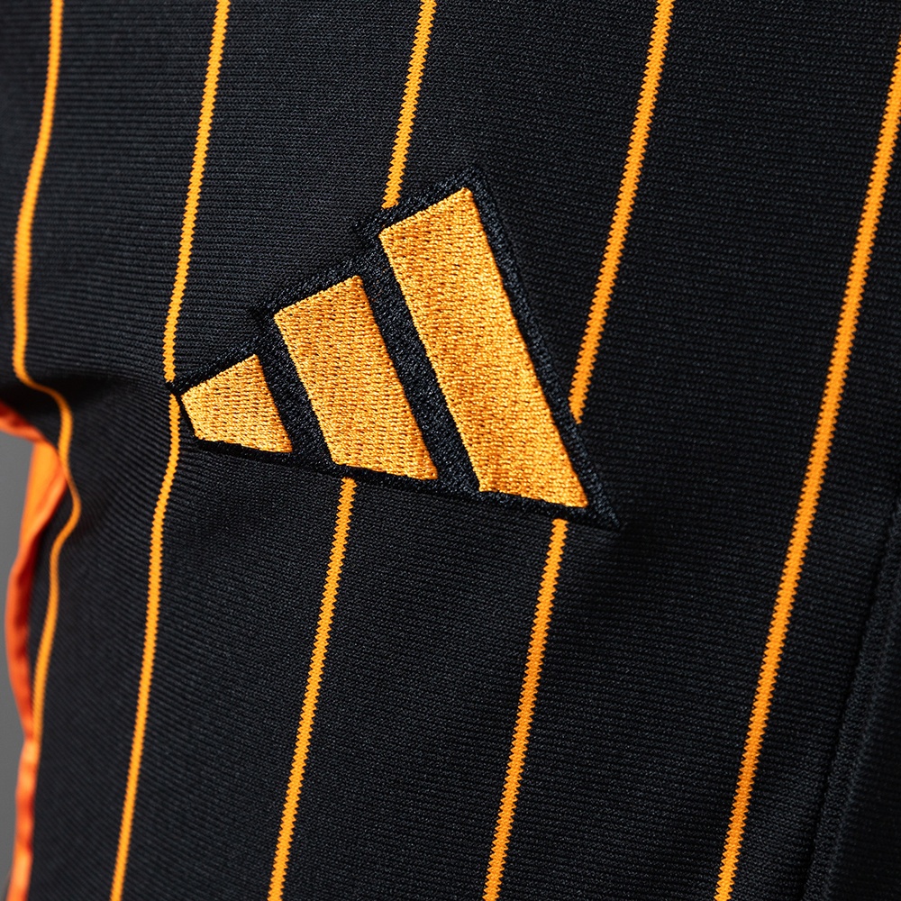2025-26 REAL MADRID BLACK AND ORANGE US PACK FAN VERSION
