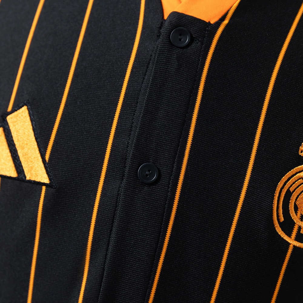 2025-26 REAL MADRID BLACK AND ORANGE US PACK FAN VERSION