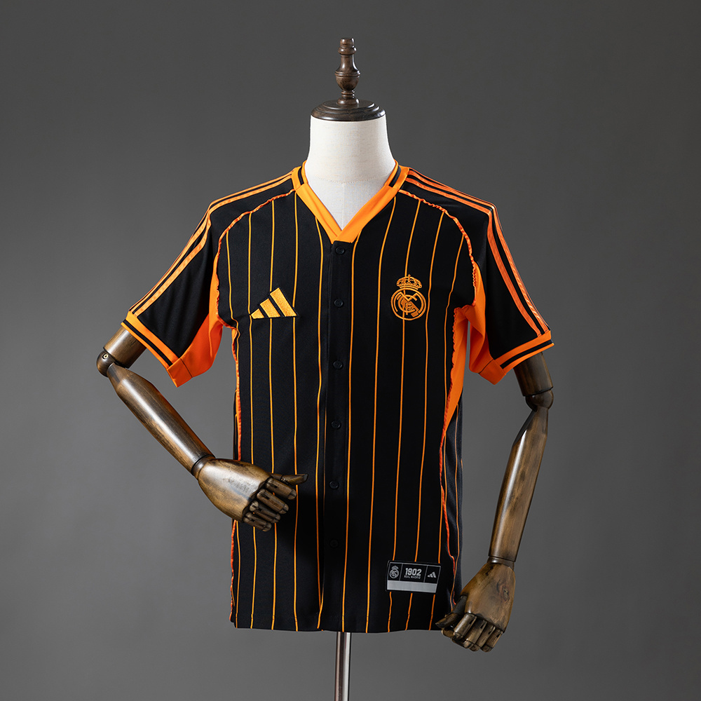 2025-26 REAL MADRID BLACK AND ORANGE US PACK FAN VERSION